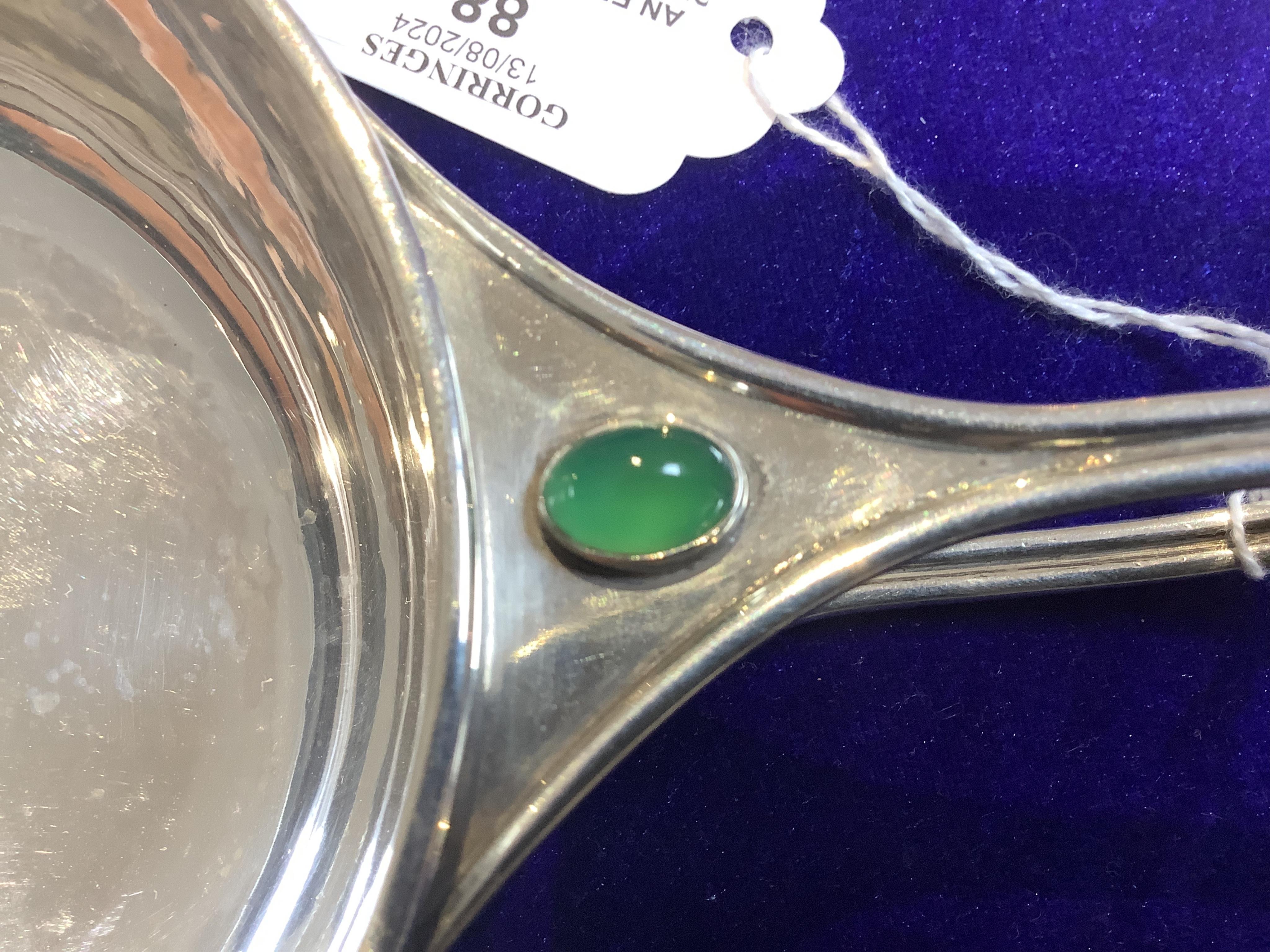 An Edwardian Arts & Crafts Charles Robert Ashbee for the Guild of Handicrafts Ltd silver and single stone cabochon chrysoprase set porringer